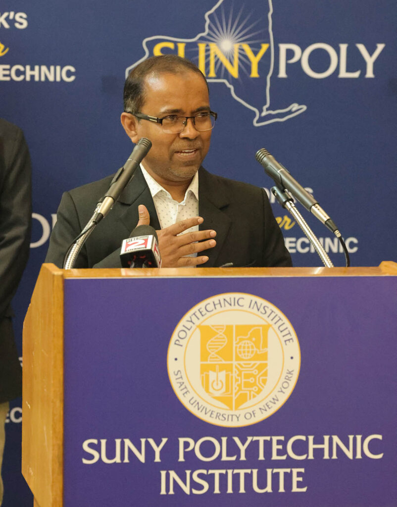 Dr. Mohammed Jasim Uddin giving a speech.