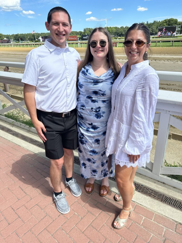 Group of Alumni photographed at the Saratoga Race Track.
