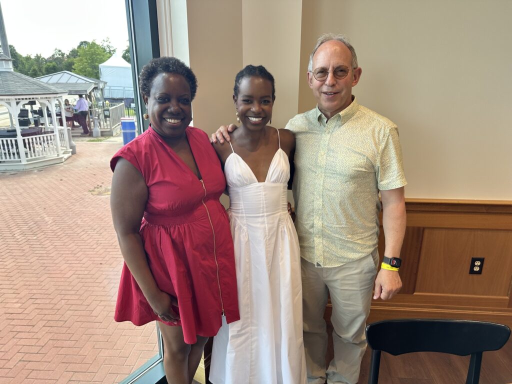 Group of Alumni photographed at the Saratoga Race Track.