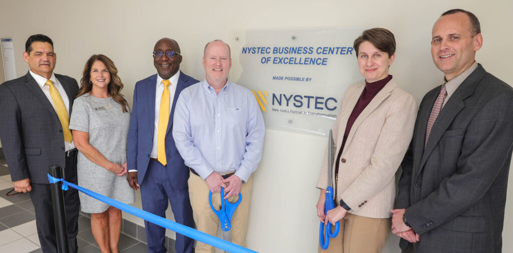 Administrative staff at the ribbon cutting ceremony for the NYSTEC Business Center of Excellence.