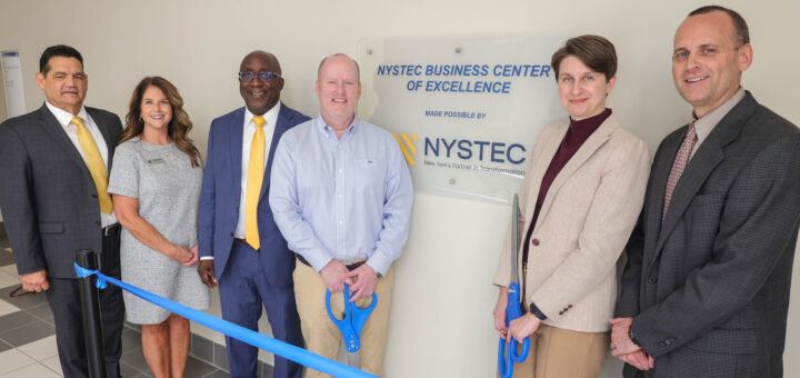 Administrative staff at the ribbon cutting ceremony for the NYSTEC Business Center of Excellence.