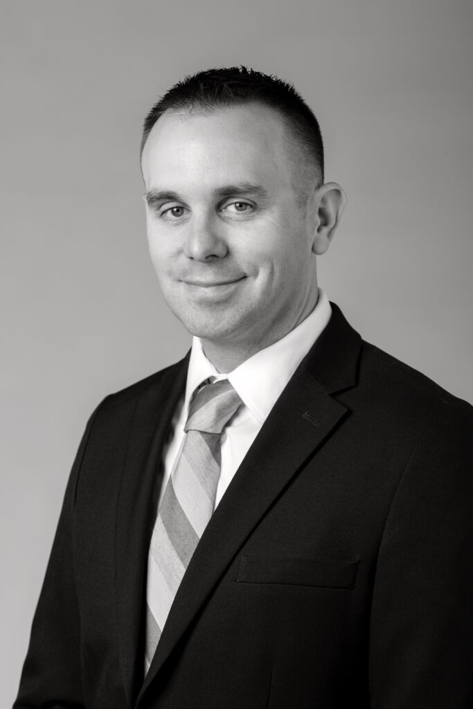 Black and white headshot of Josh French.