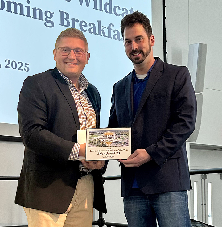 Award presentation during Wildcat Homecoming Weekend honoring the 2025 Wildcat of the Year.