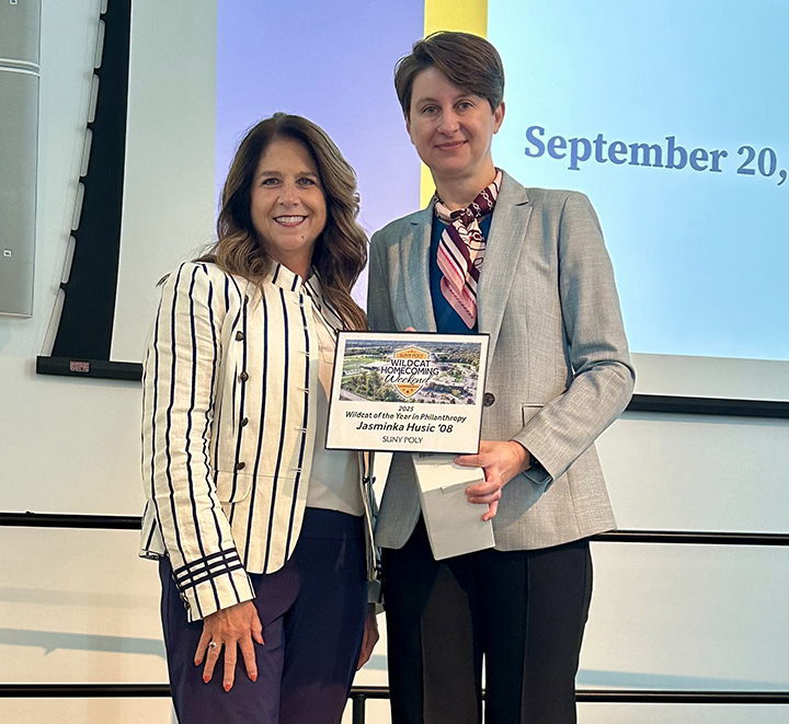 Award presentation during Wildcat Homecoming Weekend honoring the 2025 Wildcat of the Year in Philanthropy.