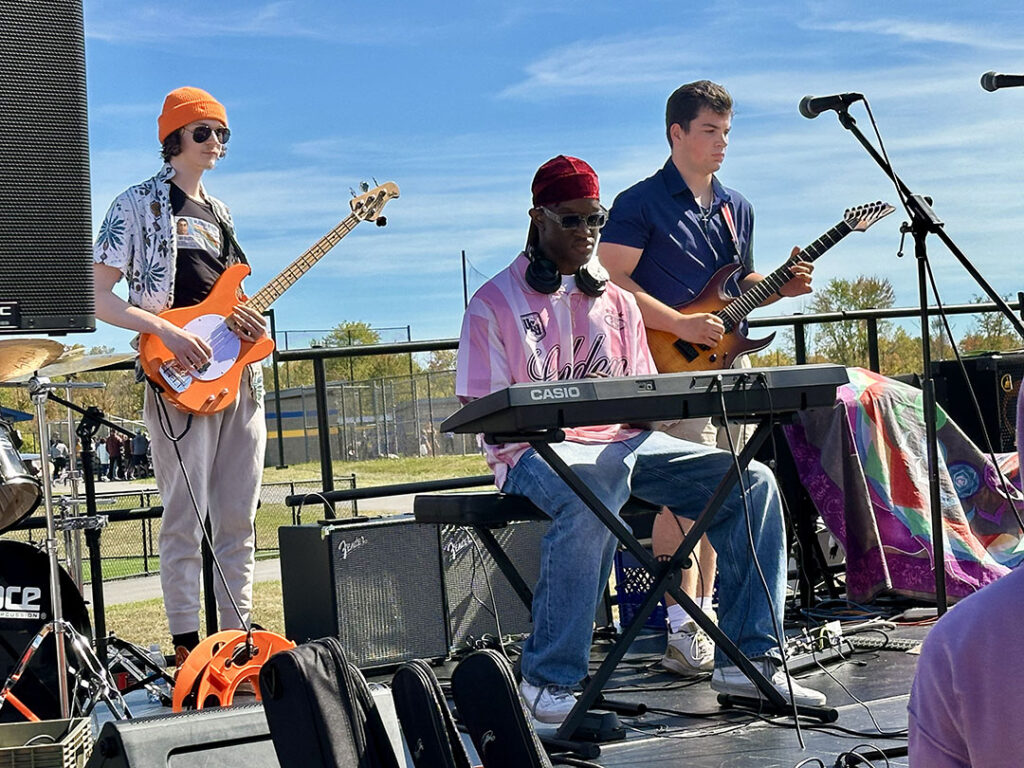 Band playing on stage at Homecoming Weekend.