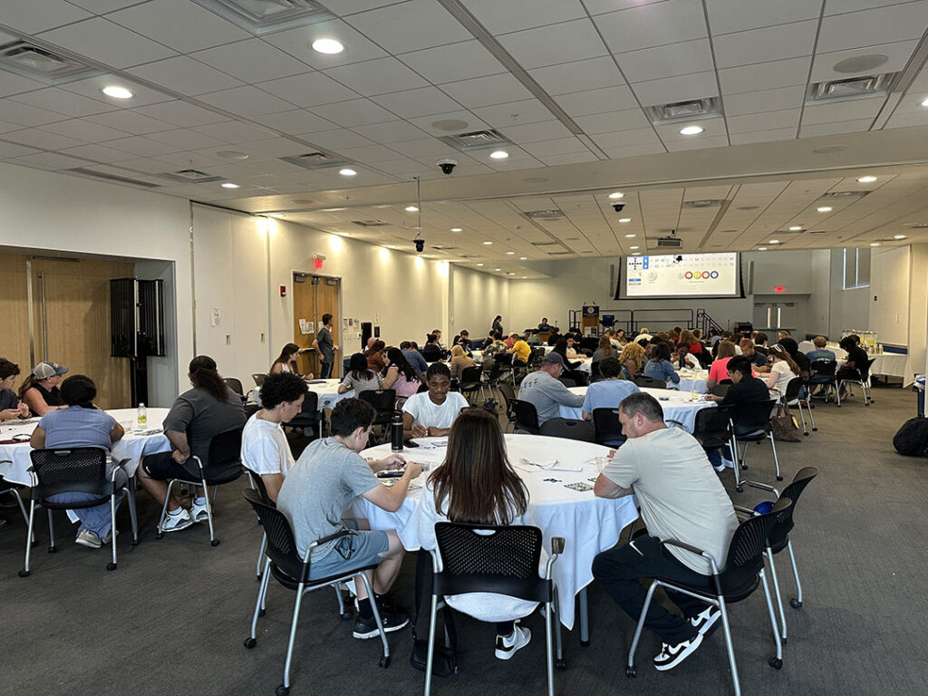Large group gathered for bingo during Homecoming Weekend.