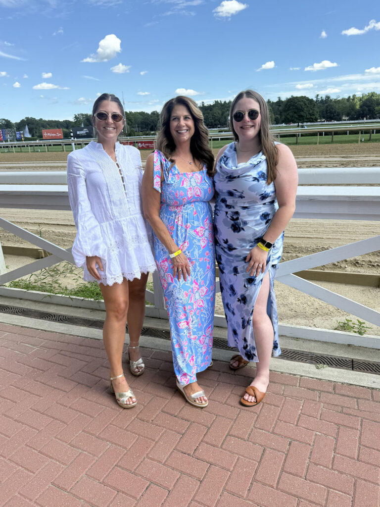 Group of Alumni photographed at the Saratoga Race Track.