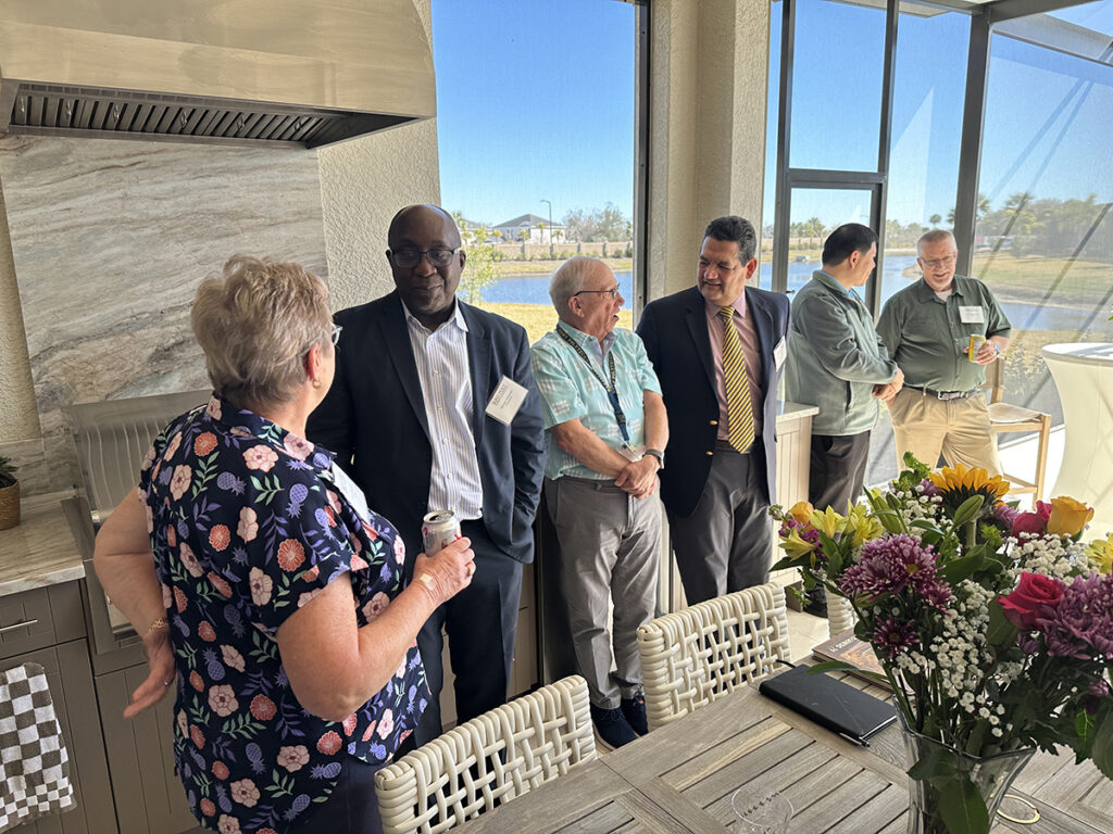 Alumni and staffed gathered in Florida.